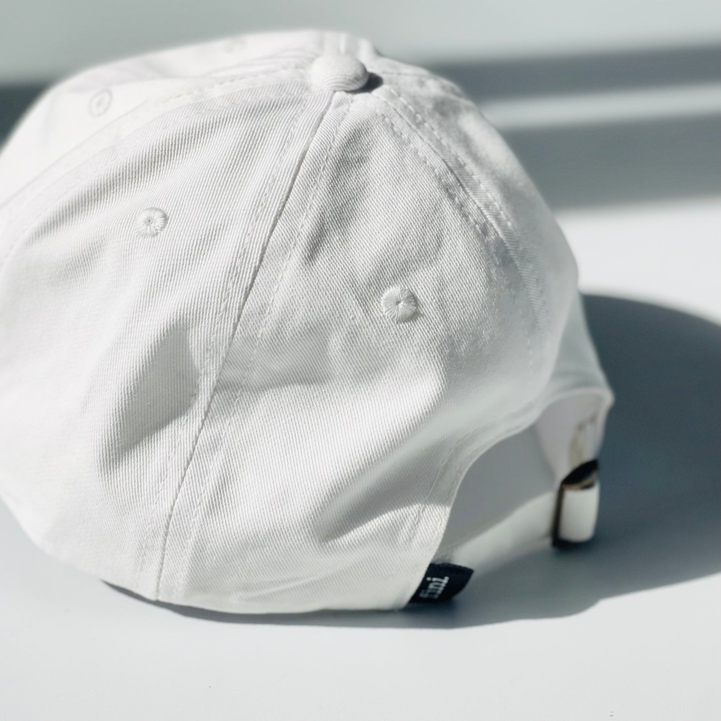 cap | coded | almost white