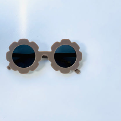 Kids flower shaped sunglasses in colour taupe