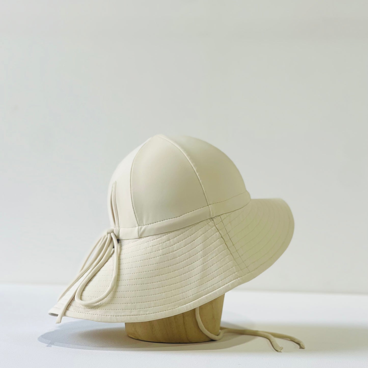 floppy hat | swim | cream