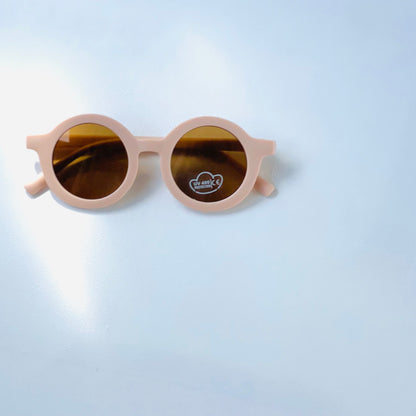 Kids round shaped sunglasses in colour pale pink 