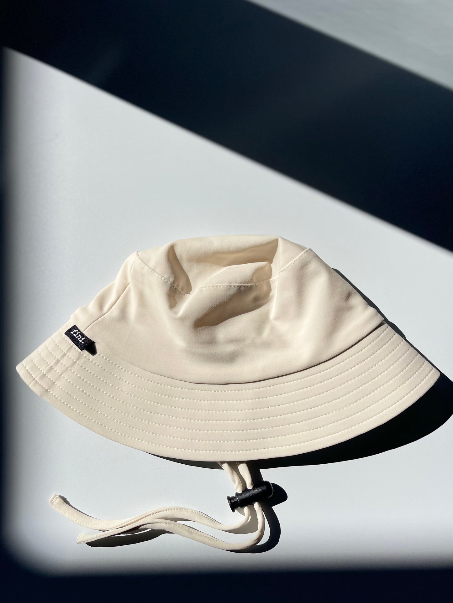 bucket hat | swim | cream