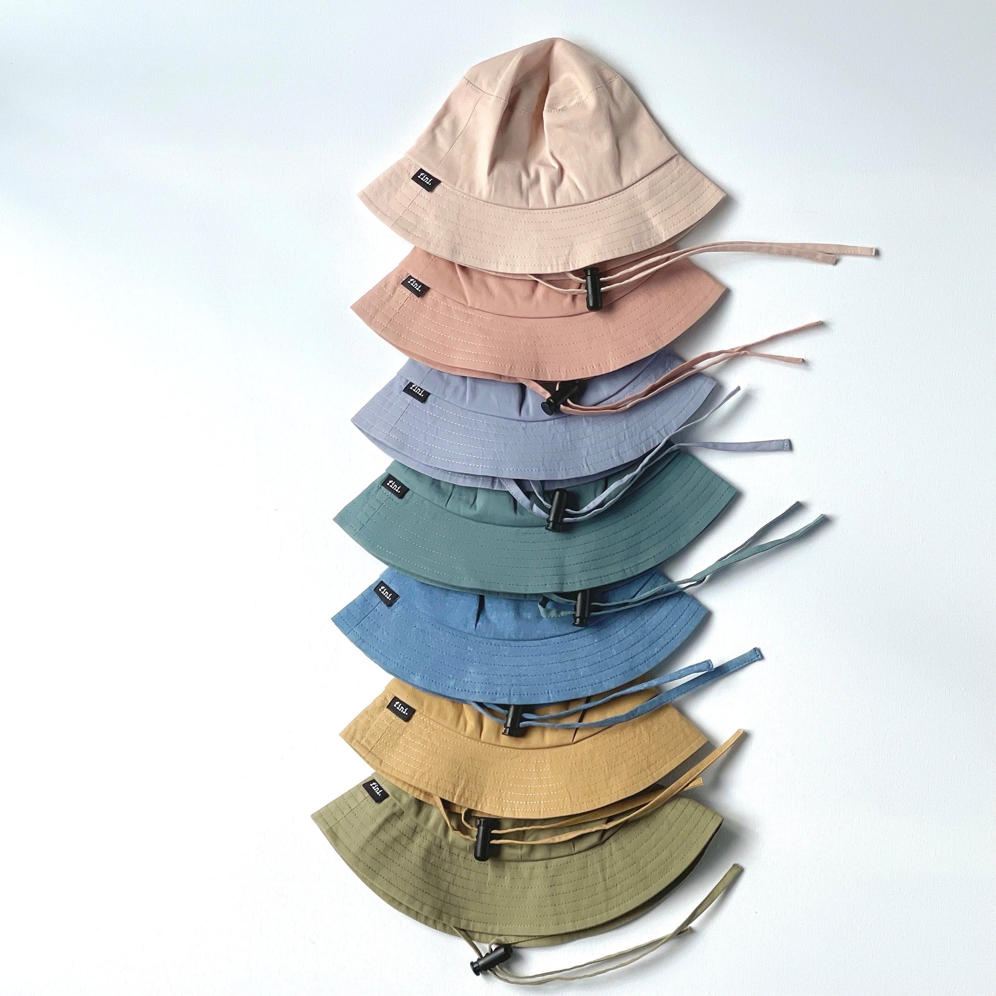 fini. bucket hat | blue-fini. the label