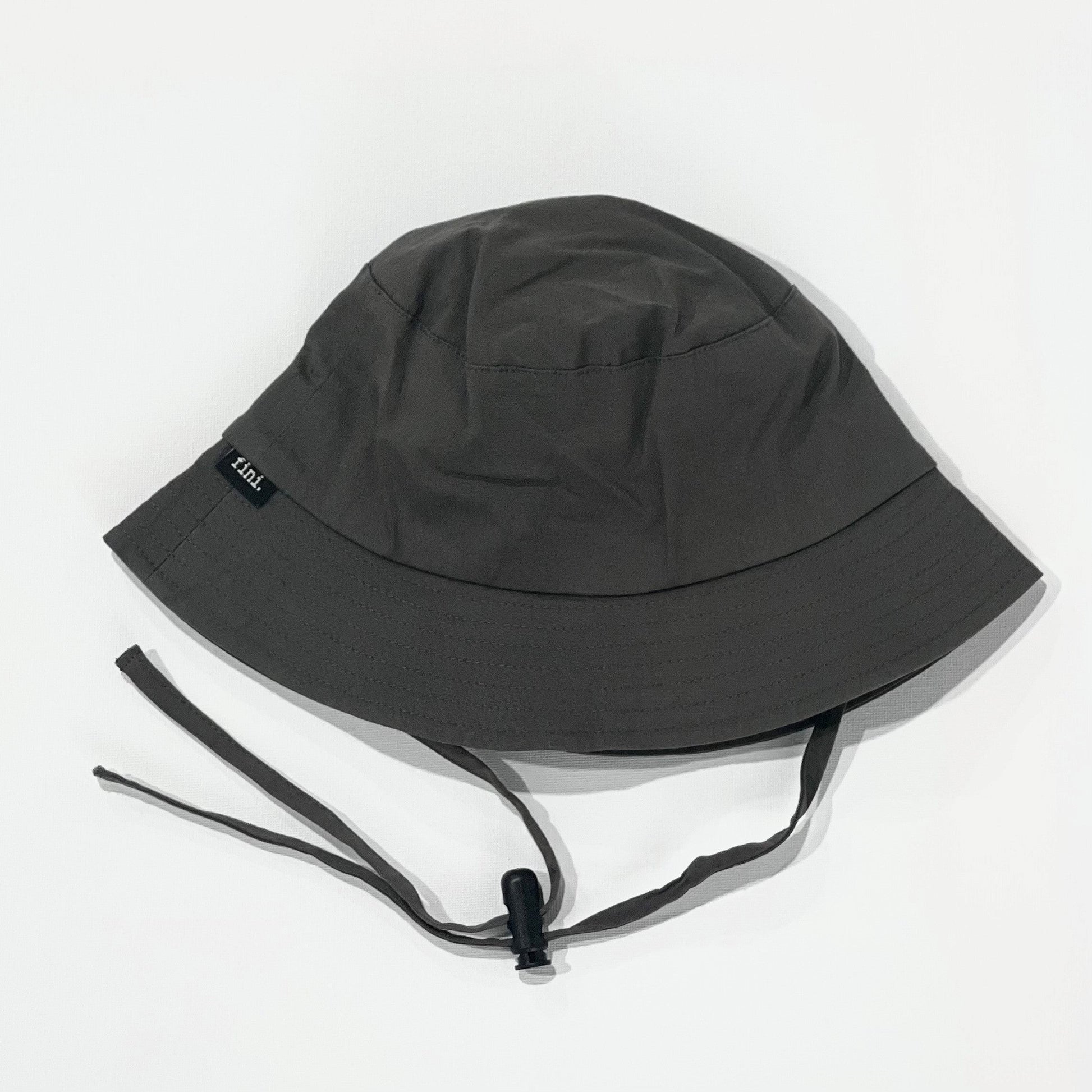 fini. bucket hat | coal-fini. the label