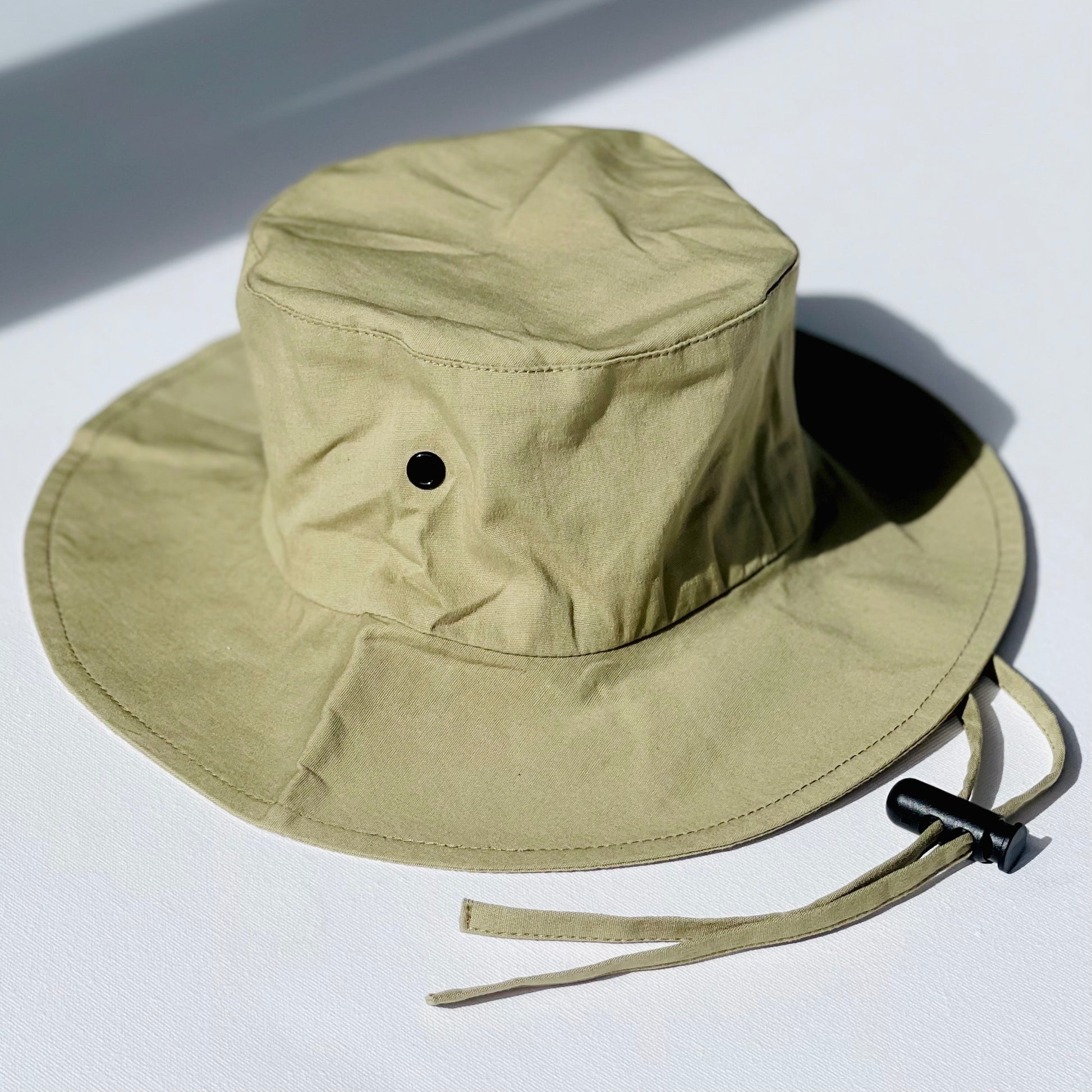 WS_available now_FINI. HAT: fini. relaxed bucket hat - sage-fini. the label