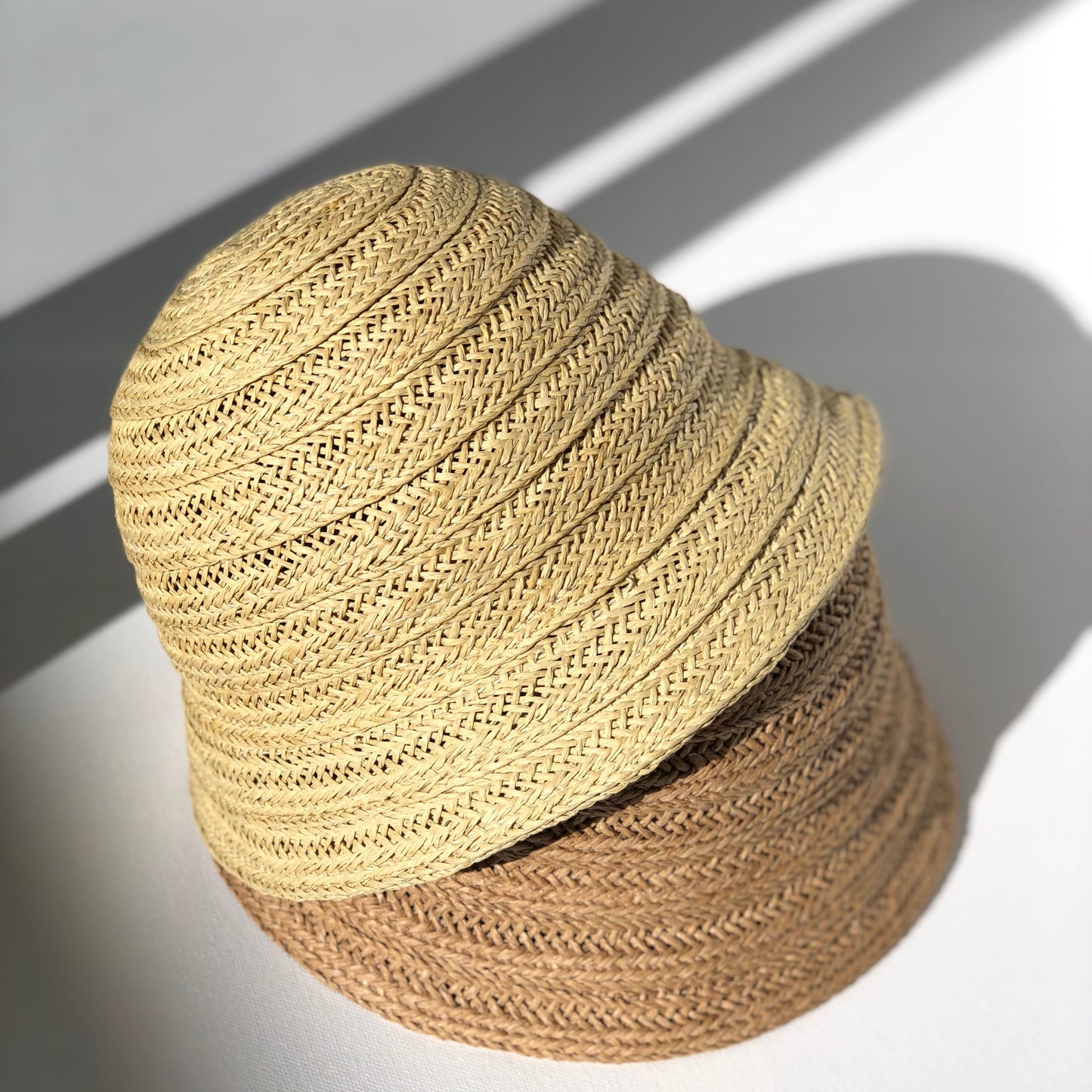 WS_available now_FINI. HAT : straw bucket hat-fini. the label