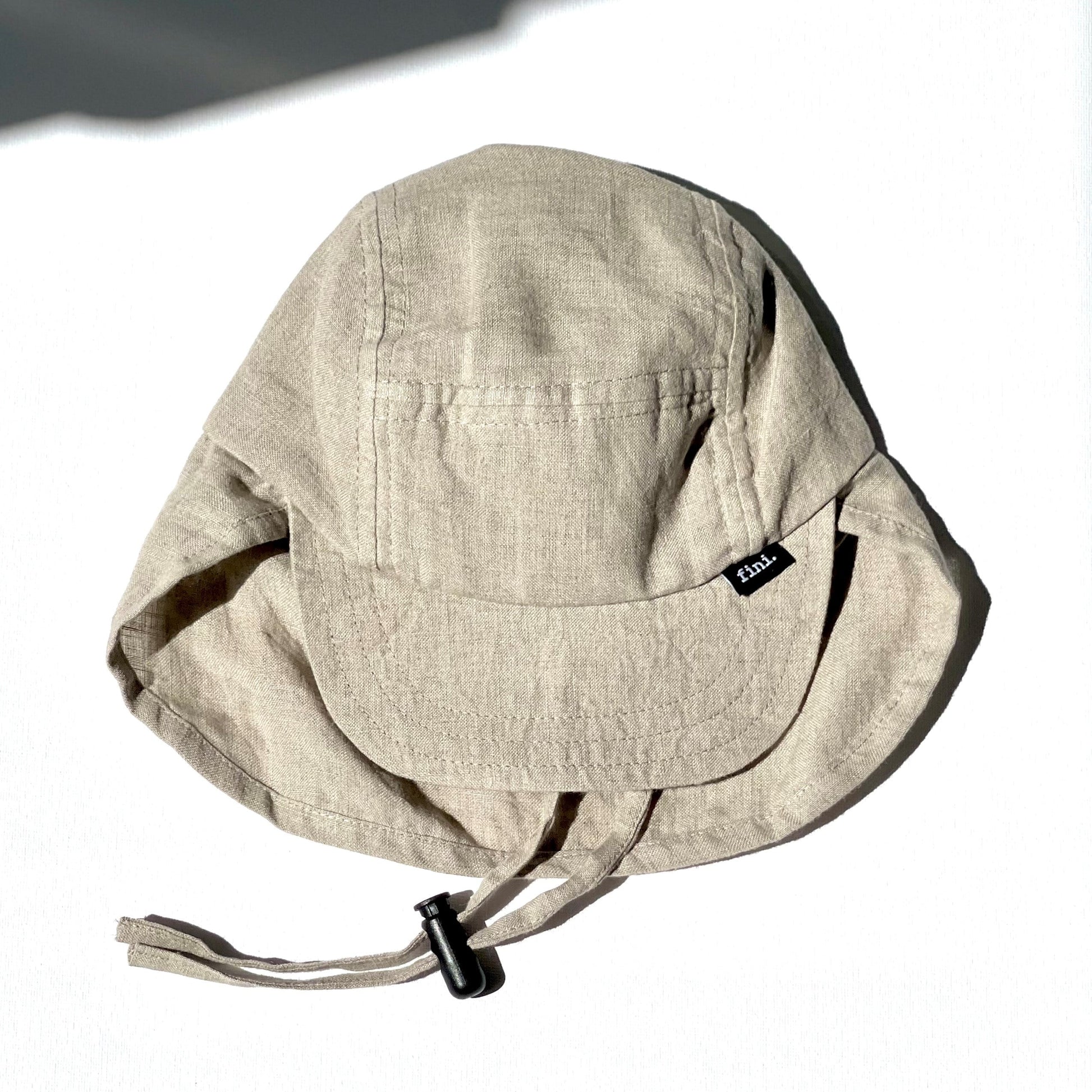 WS_available now_FINI. HAT: fini. legionnaire hat - linen-fini. the label