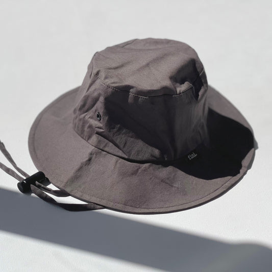 fini. relaxed bucket hat | coal-fini. the label