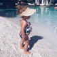toddler in sun hat light palm visor fini. the label premium fashion
