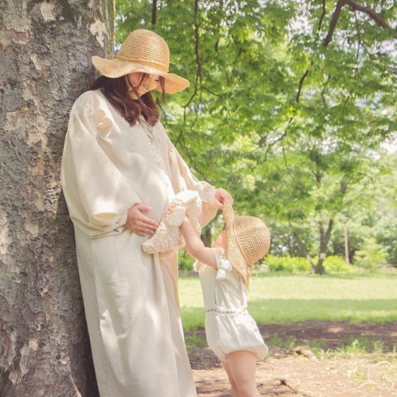 mother and daughter matching fini. straw hats light colour australia
