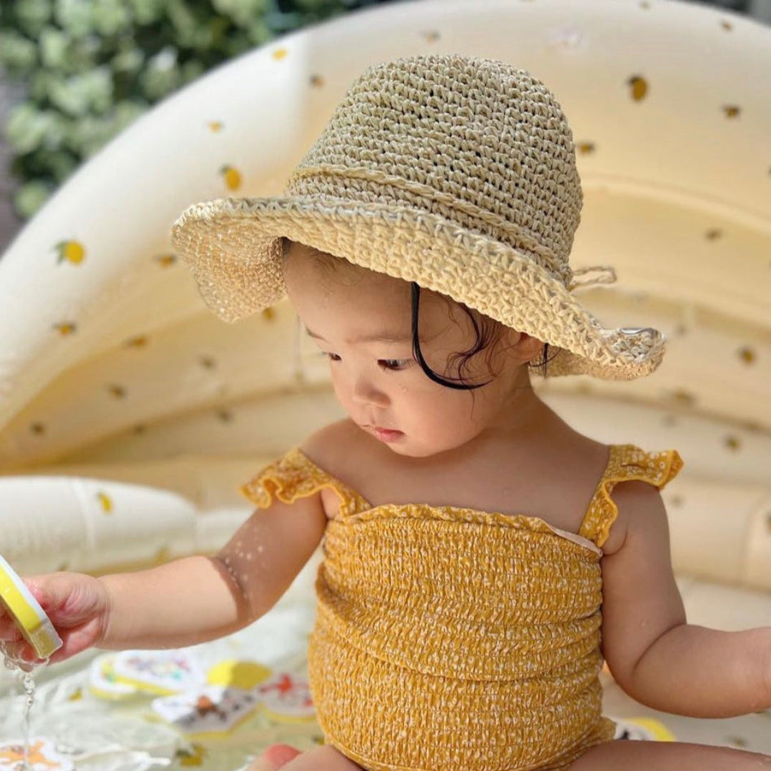 foldable toddler straw hat light tone fini. the label travel friendly